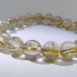 nblrt26-gold-rutilated-quartz-bracelet-(9-mm)-1527502231274.jpg
