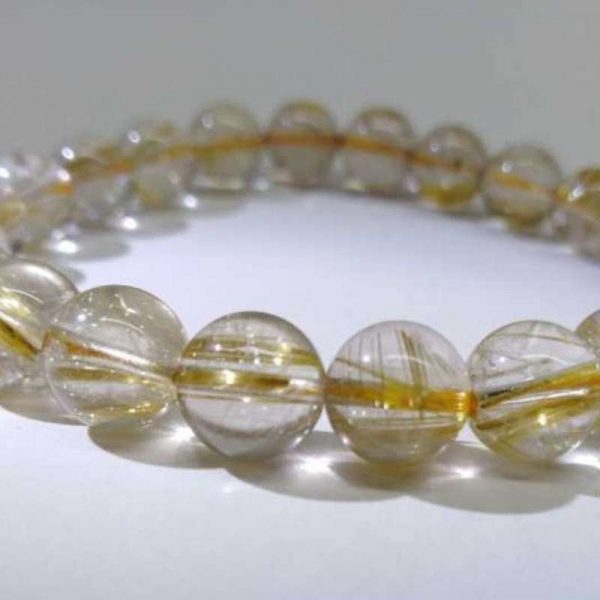 nblrt26-gold-rutilated-quartz-bracelet-(9-mm)-1527502231274.jpg