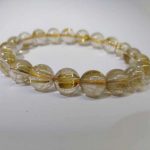 nblrt28-gold-rutilated-quartz-bracelet-(11-mm)-1527502663691.jpg