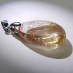 npdrt45-red-and-gold-rutilated-quartz-pendant-1528118930295.jpg
