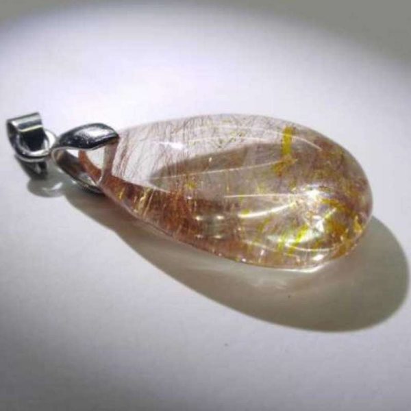 npdrt45-red-and-gold-rutilated-quartz-pendant-1528118930295.jpg