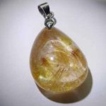 npdrt47-red-and-gold-rutilated-quartz-pendant-1528119806750.jpg